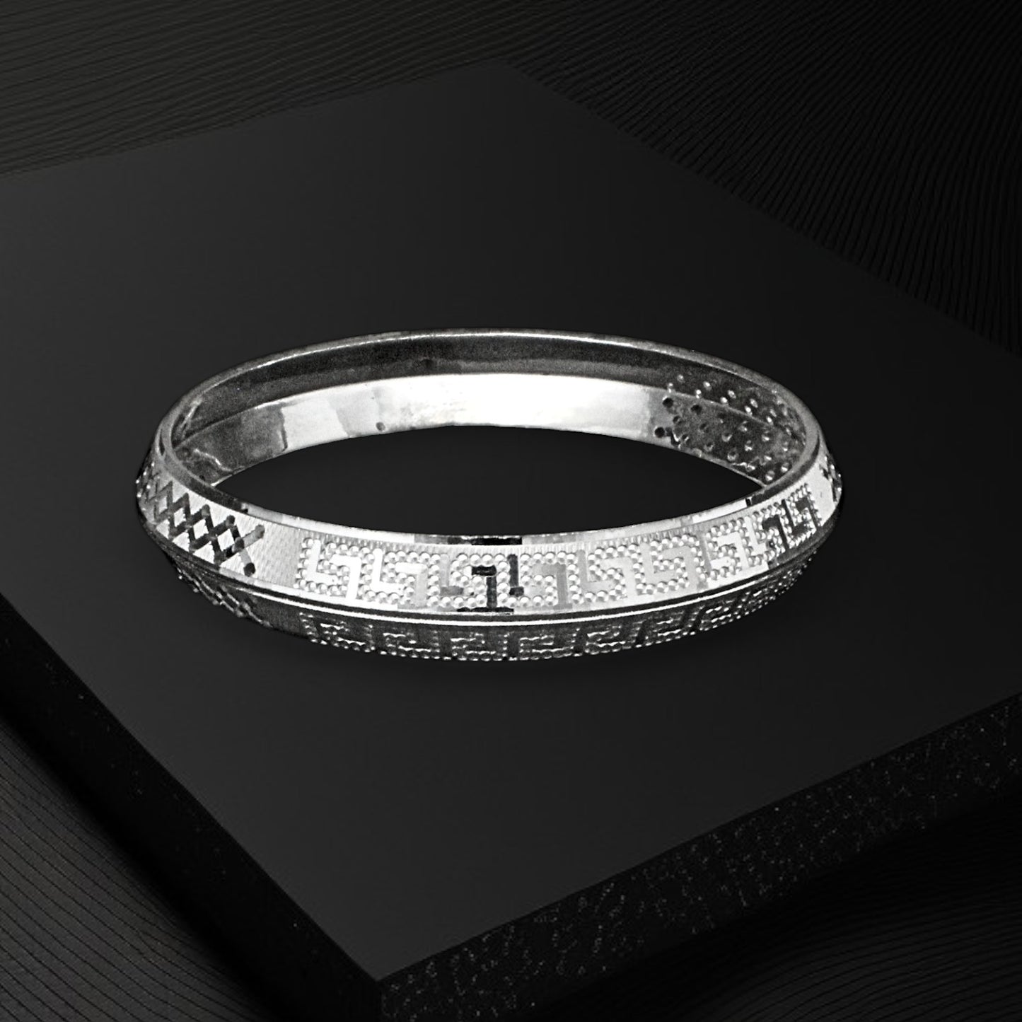 Real Silver Men's Bangle with a unique pattern engraved on it