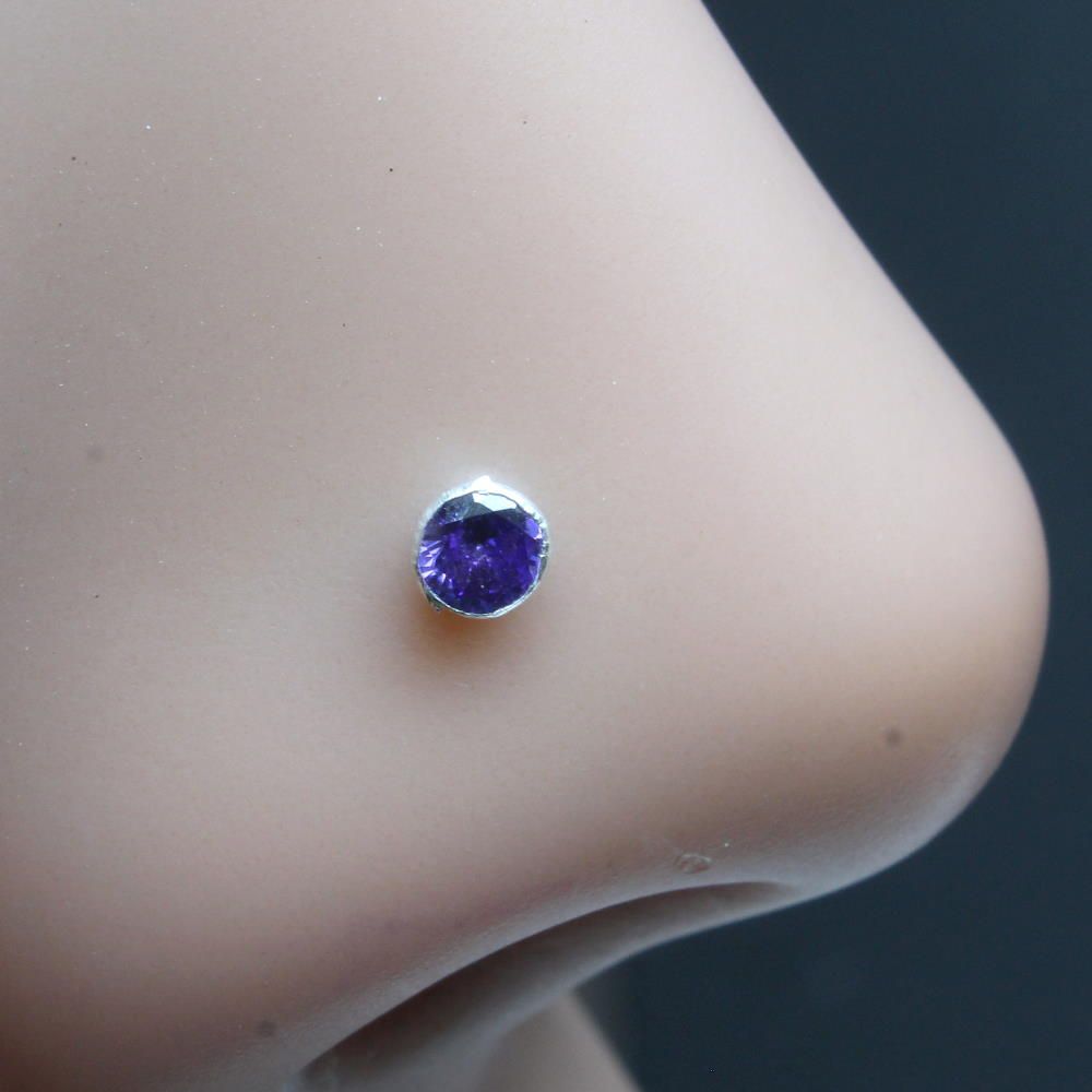 Silver Nose pin with purple color stone 